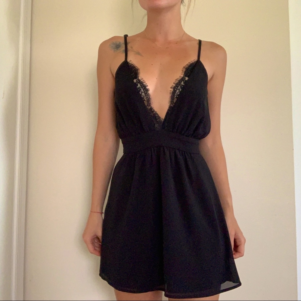 Black low v-neck minidress